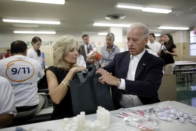Dr. Jill Biden and Vice President Joe Biden make care packages for the troops at PS 140